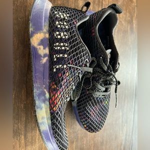 NOBULL mesh runners in dark purple and black tie-dye.